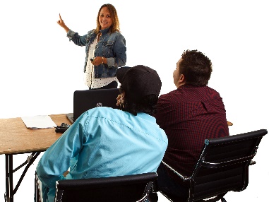 A teacher teaching in front of 2 students.