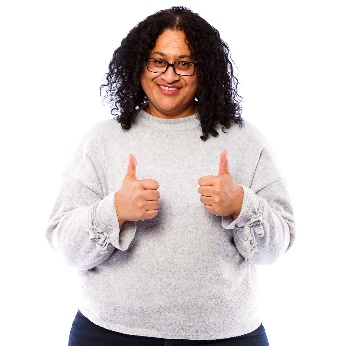 A woman giving 2 thumbs up.